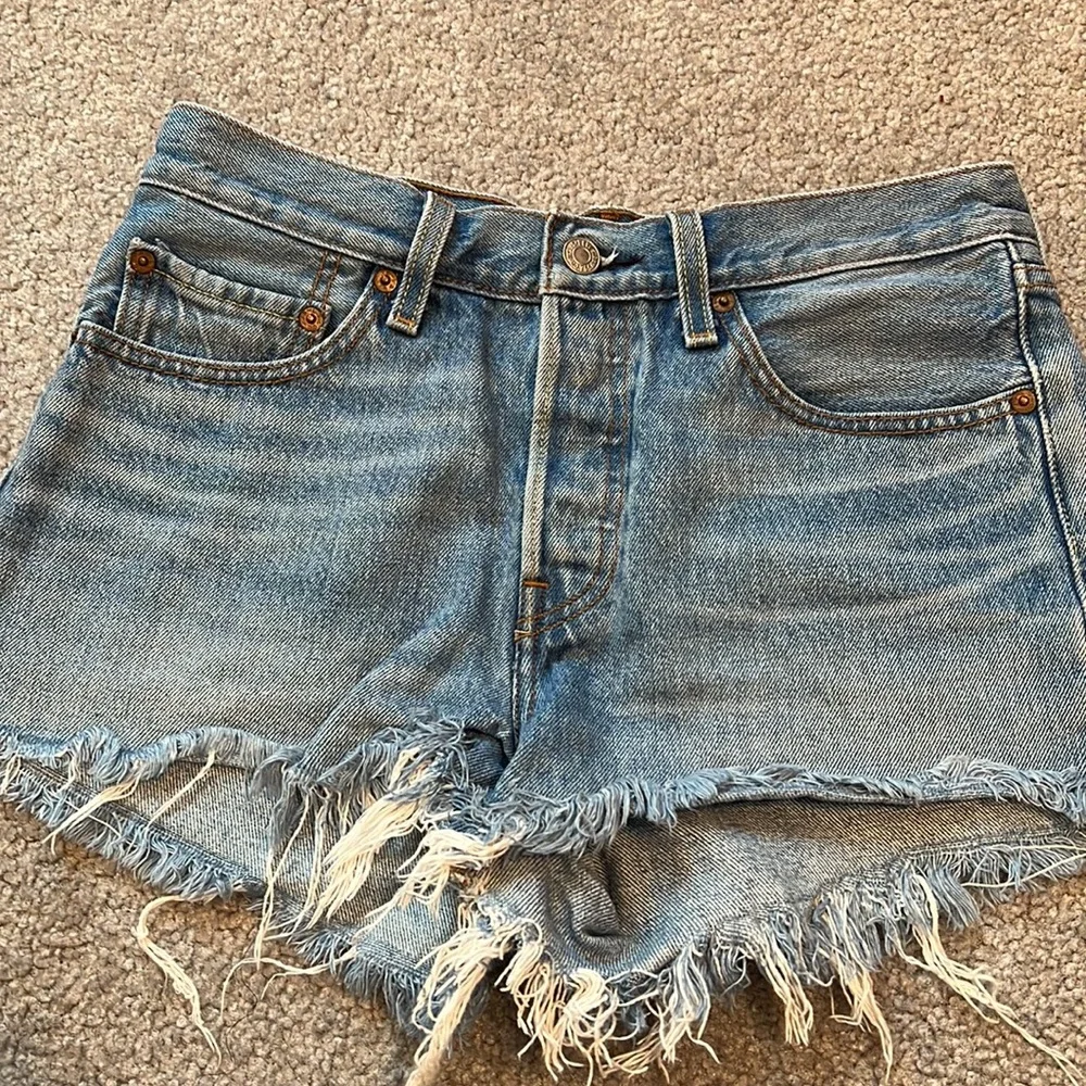 Levi’s High Waisted Frayed Hem Denim Shorts
